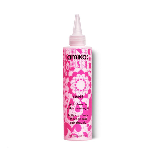 Amika reset pink charcoal scalp cleansing oil bottle